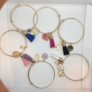 NWT Handmade stackable charm bracelet. Pink gold